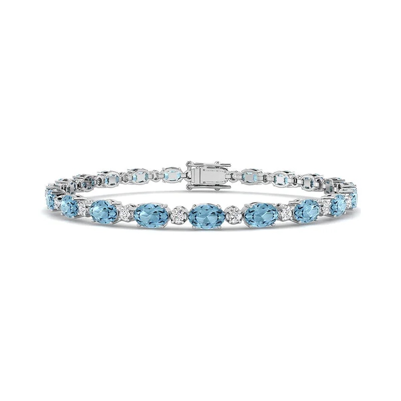 Matte - Black Ceramic Wedding Bands with a Polished Edge for a Sleek and Modern AppearanceOval Aquamarine & Round Diamond Bracelet Matte - Black Ceramic Wedding Bands with a Polished Edge for a Sleek and Modern AppearanceOval Aquamarine & Round Diamond Bracelet