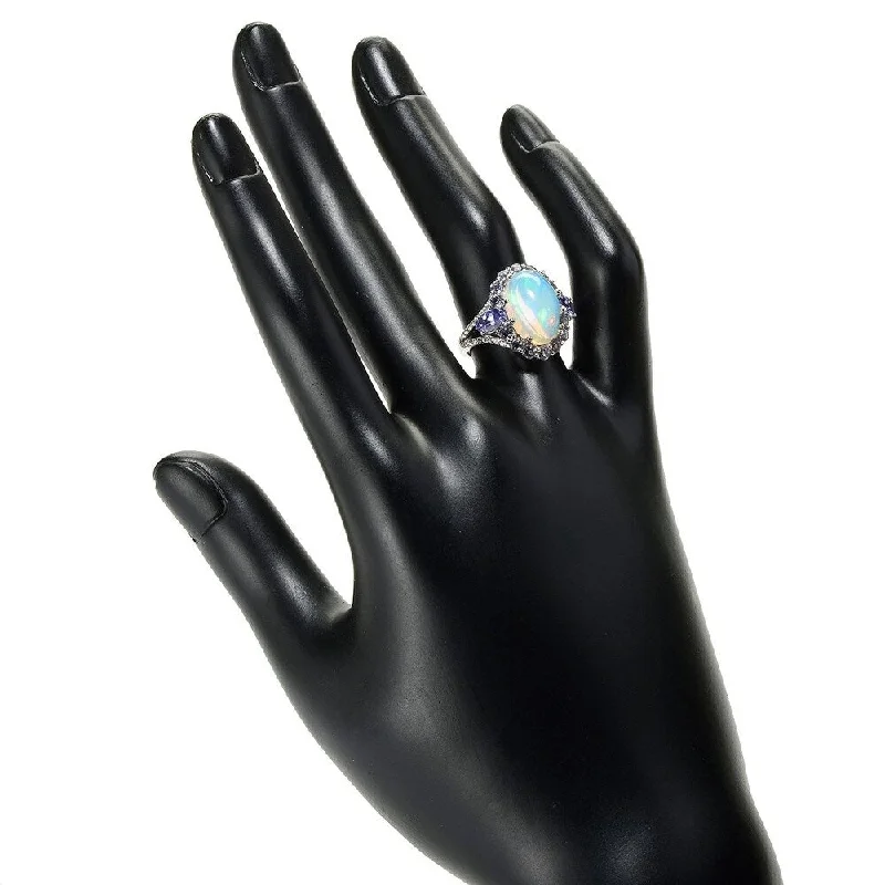 Tanzanite Gemstone Rings in 10K Gold with a Trilogy Design for a Sophisticated GiftSterling Silver 14 x 10mm Ethiopian Opal & Multi Gemstone Halo Ring Tanzanite Gemstone Rings in 10K Gold with a Trilogy Design for a Sophisticated GiftSterling Silver 14 x 10mm Ethiopian Opal & Multi Gemstone Halo Ring