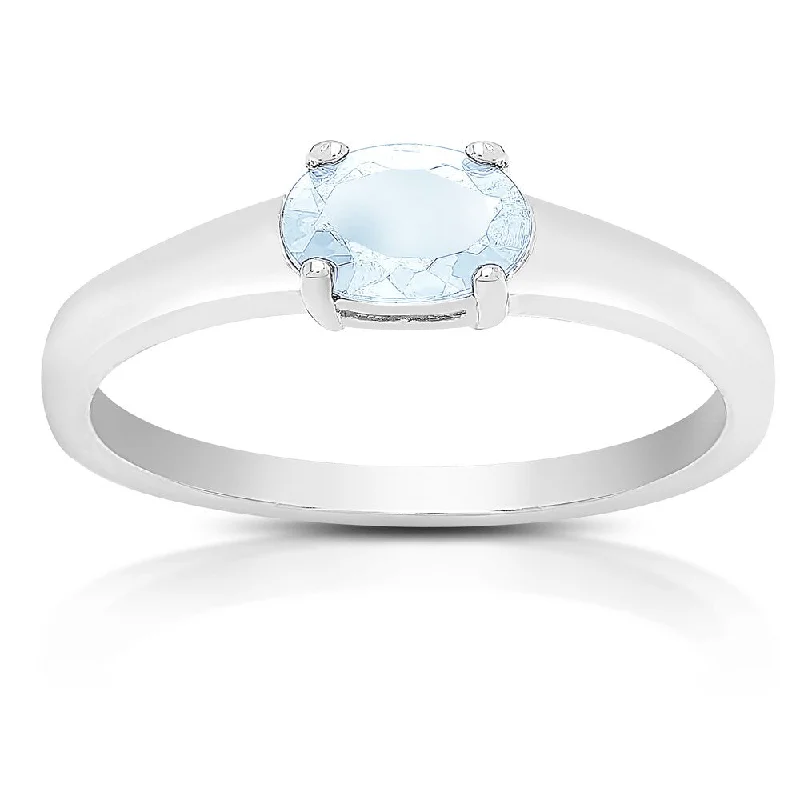 Malachite Gemstone Rings in 14K Gold with a Carved Stone for a Unique and Artistic AppealDolce Giavonna Sterling Silver Blue Topaz Oval Solitaire Ring
