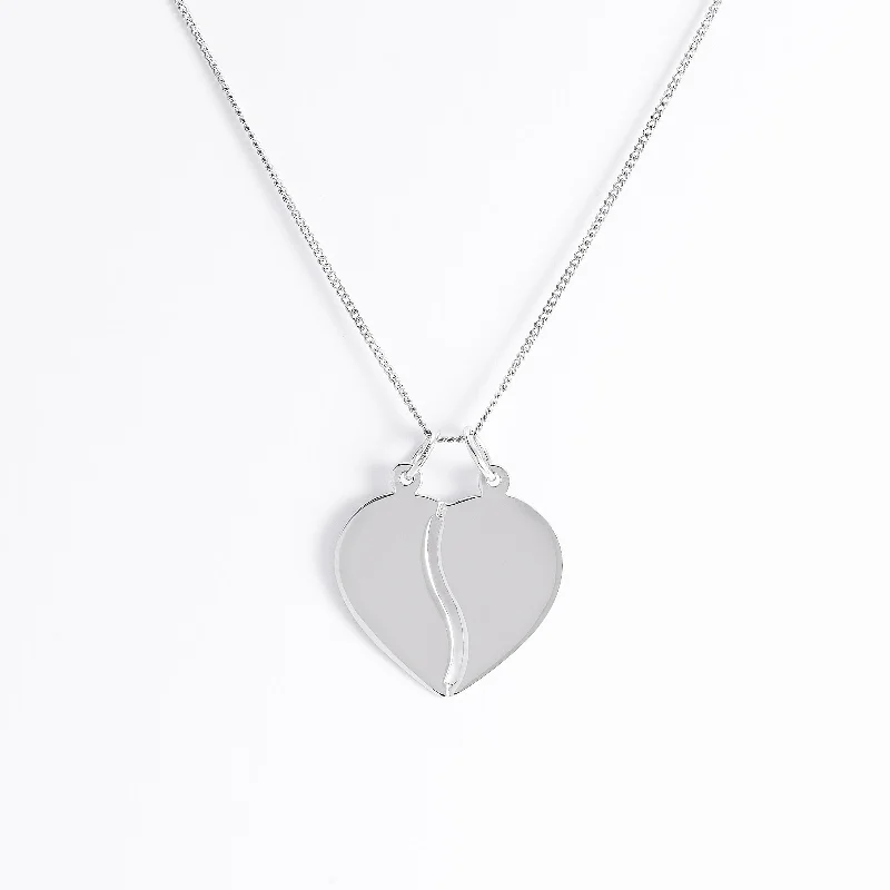 Two - Tone Gold and Silver Wedding Bands with a Twist Design for a Contemporary and Eye - Catching StyleSterling Silver Share-A-Heart Pendant Two - Tone Gold and Silver Wedding Bands with a Twist Design for a Contemporary and Eye - Catching StyleSterling Silver Share-A-Heart Pendant