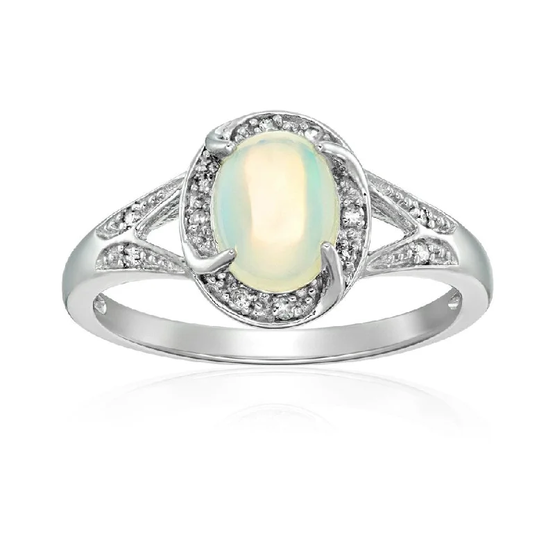 Iolite Gemstone Rings in 10K Gold with a Twisted Band for a Distinctive and Stylish AccessorySterling Silver Ethiopian Opal & Diamond Accented Engagement Ring Size - 7 Iolite Gemstone Rings in 10K Gold with a Twisted Band for a Distinctive and Stylish AccessorySterling Silver Ethiopian Opal & Diamond Accented Engagement Ring Size - 7