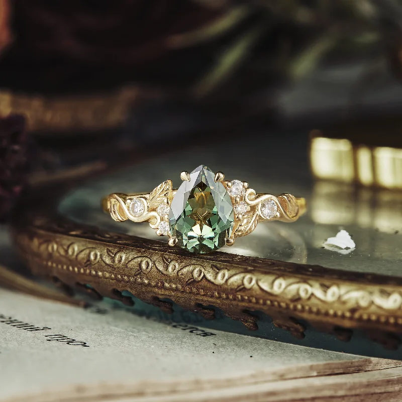 Men's Alexandrite Engagement Rings in Platinum with a Hidden Halo of DiamondsNature's Embrace: Green Sapphire Leaf Ring - Lila Men's Alexandrite Engagement Rings in Platinum with a Hidden Halo of DiamondsNature's Embrace: Green Sapphire Leaf Ring - Lila