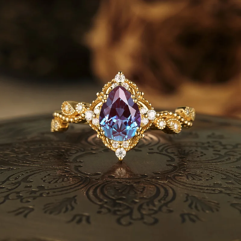 Men's Tanzanite Engagement Rings in Palladium with a Three - Stone ArrangementGemsMagic Pear Cut Alexandrite Twisted Engagement Ring Men's Tanzanite Engagement Rings in Palladium with a Three - Stone ArrangementGemsMagic Pear Cut Alexandrite Twisted Engagement Ring