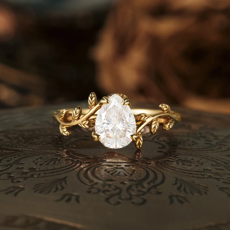 Men's Diamond Engagement Rings with Platinum Band and Halo Setting for a Luxury ProposalGemsMagic Pear Moissanite Leaf Design Engagement Ring Men's Diamond Engagement Rings with Platinum Band and Halo Setting for a Luxury ProposalGemsMagic Pear Moissanite Leaf Design Engagement Ring