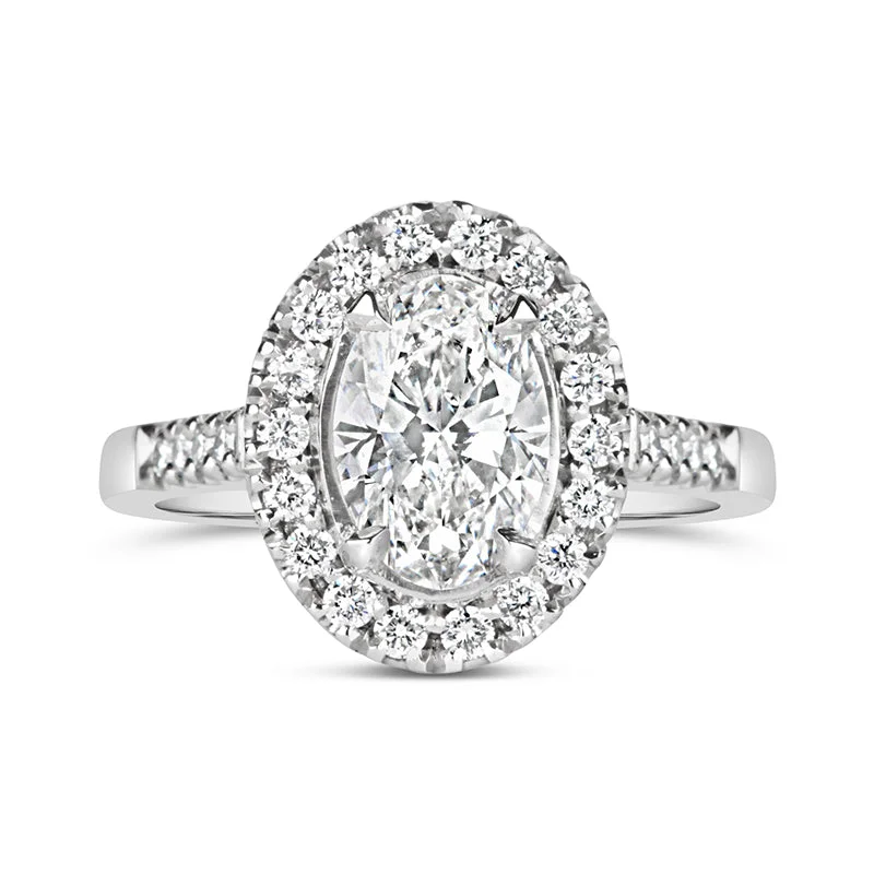 Rose Gold - Plated Engagement and Wedding Band Sets with a Halo of Cubic Zirconia for a Glamorous and Affordable LookOval Halo Engagement Ring 1.71ct Rose Gold - Plated Engagement and Wedding Band Sets with a Halo of Cubic Zirconia for a Glamorous and Affordable LookOval Halo Engagement Ring 1.71ct
