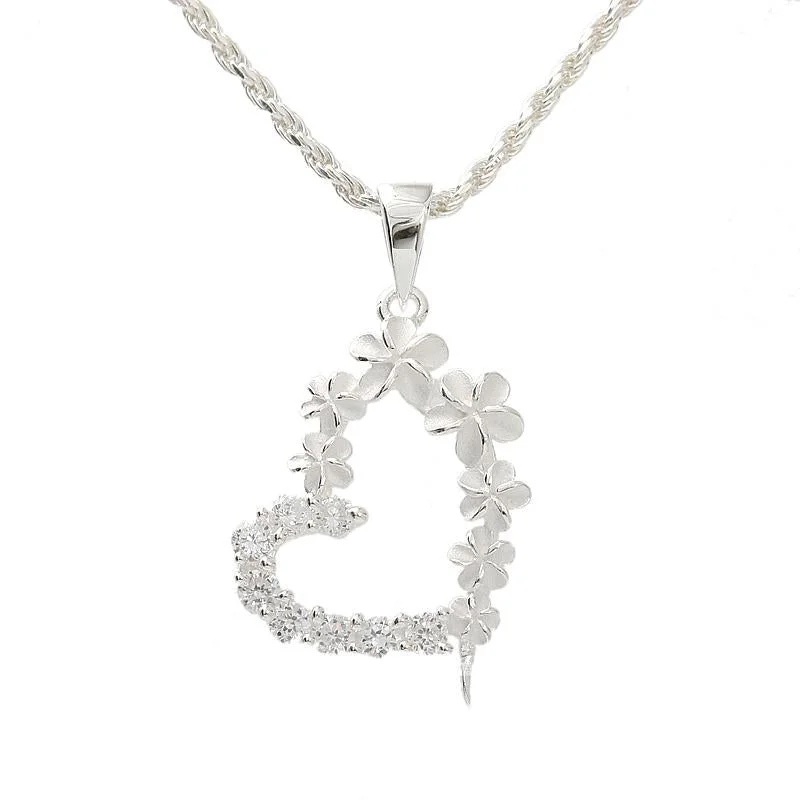 Magnetic - Closure Pendant Necklace with a Hidden Compartment for Secret KeepersSterling Silver Half Plumeria, Half CZ Heart Pendant (Chain Sold Separately) Magnetic - Closure Pendant Necklace with a Hidden Compartment for Secret KeepersSterling Silver Half Plumeria, Half CZ Heart Pendant (Chain Sold Separately)
