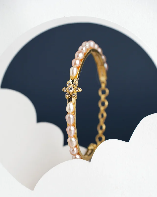 Mother - of - Pearl Inlay Pearl Bracelet with Brass Accents for a Luxurious TextureAstoria Tulip Pearl Bangle for kids Mother - of - Pearl Inlay Pearl Bracelet with Brass Accents for a Luxurious TextureAstoria Tulip Pearl Bangle for kids
