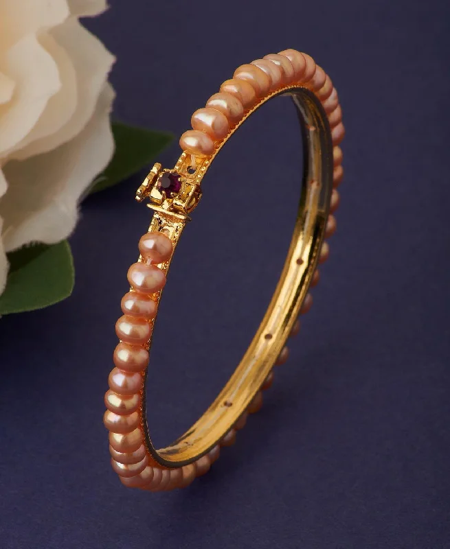 Pearl Bracelet with Zodiac Charm for a Personalized and Symbolic AccessoryClassy Pink Pearl Bangle Pearl Bracelet with Zodiac Charm for a Personalized and Symbolic AccessoryClassy Pink Pearl Bangle