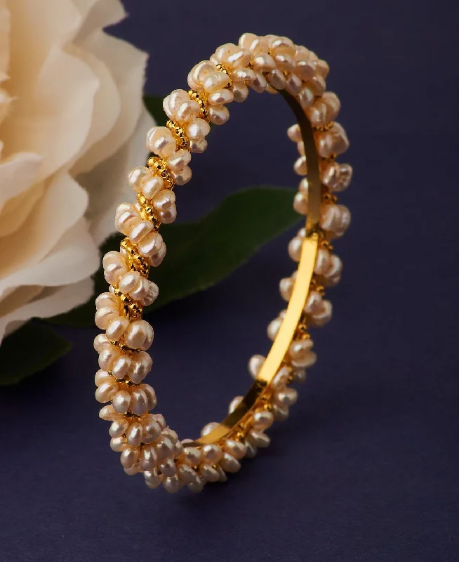 Pearl and Leather Cuff Bracelet with Studded Embellishments for a Rocker - Inspired StyleElegant and classy Pearl Bangle Pearl and Leather Cuff Bracelet with Studded Embellishments for a Rocker - Inspired StyleElegant and classy Pearl Bangle