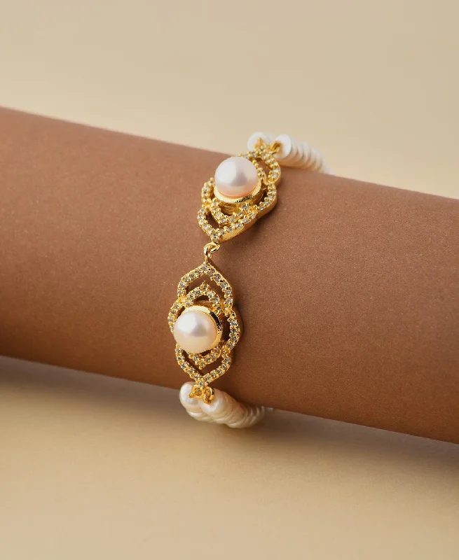 Pearl and Leather Cuff Bracelet with Studded Embellishments for a Rocker - Inspired StyleElegant and classy Pearl Bracelet Pearl and Leather Cuff Bracelet with Studded Embellishments for a Rocker - Inspired StyleElegant and classy Pearl Bracelet