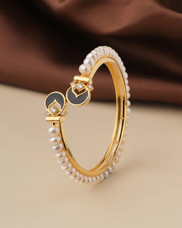 Adjustable Leather and Pearl Bracelet with Braided Detail for a Boho - Chic VibeFashionable Stone Studded Pearl Bangle Adjustable Leather and Pearl Bracelet with Braided Detail for a Boho - Chic VibeFashionable Stone Studded Pearl Bangle