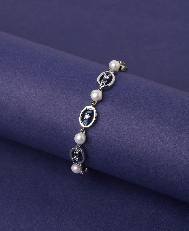 Men's Minimalist Pearl Bracelet with Matte Black Metal Accents for a Modern AestheticFashionable Stone Studded Pearl Bracelet Men's Minimalist Pearl Bracelet with Matte Black Metal Accents for a Modern AestheticFashionable Stone Studded Pearl Bracelet