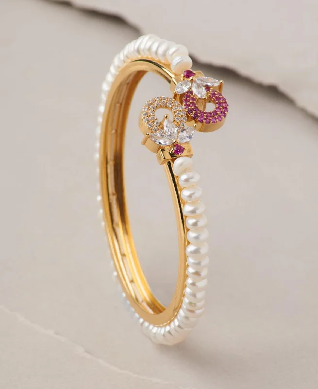 Stackable Pearl Bracelet Set with Mixed - Sized Pearls for a Trendy Layered StyleFloral Stone Studded Pearl Bangle Stackable Pearl Bracelet Set with Mixed - Sized Pearls for a Trendy Layered StyleFloral Stone Studded Pearl Bangle