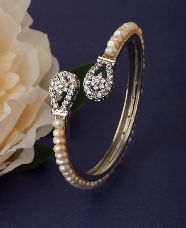 Pearl and Crystal - Embellished Bracelet with Rhinestone - Studded Clasp for a Glamorous Party LookFloral Stone Studded Pearl Bangle Pearl and Crystal - Embellished Bracelet with Rhinestone - Studded Clasp for a Glamorous Party LookFloral Stone Studded Pearl Bangle