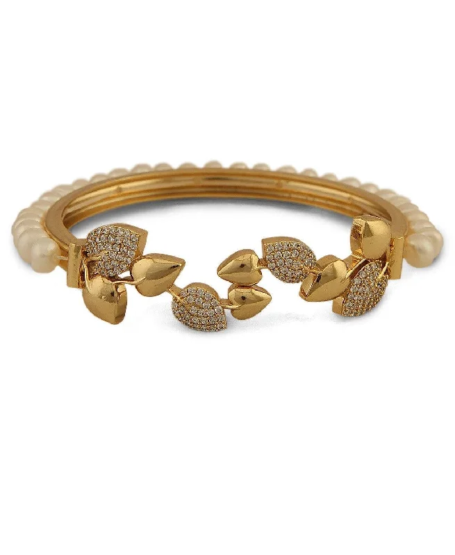 Pearl and Leather Cuff Bracelet with Studded Embellishments for a Rocker - Inspired StyleGorgeous and Trendy Pearl Bangle Pearl and Leather Cuff Bracelet with Studded Embellishments for a Rocker - Inspired StyleGorgeous and Trendy Pearl Bangle