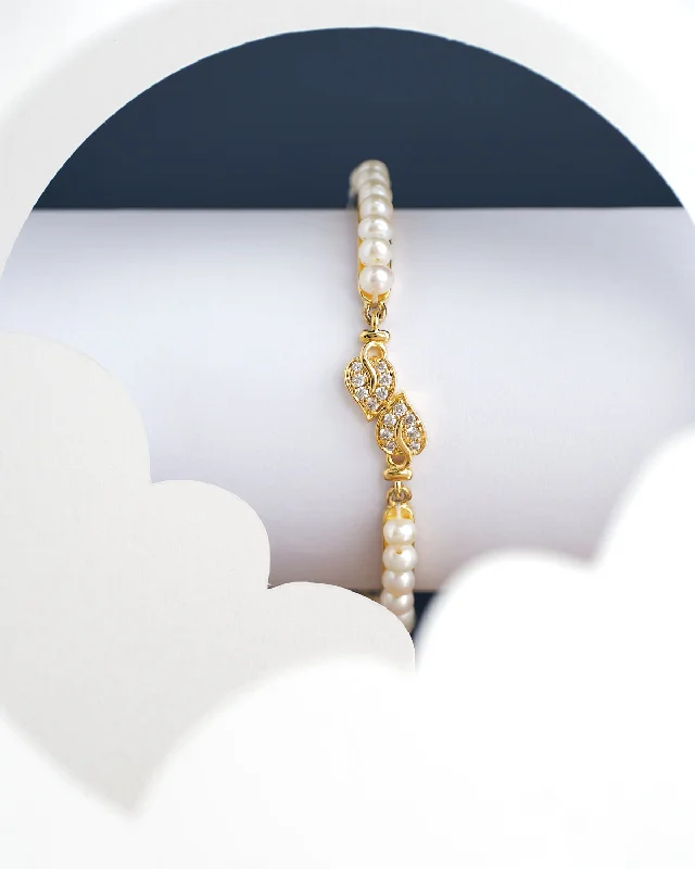 Pearl and Crystal - Embellished Bracelet with Rhinestone - Studded Clasp for a Glamorous Party LookLeafy Pearl Bangle for kids Pearl and Crystal - Embellished Bracelet with Rhinestone - Studded Clasp for a Glamorous Party LookLeafy Pearl Bangle for kids