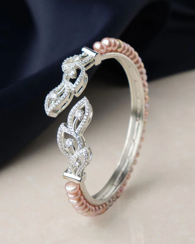 Adjustable Leather and Pearl Bracelet with Braided Detail for a Boho - Chic VibeLeafy Stone Studded Pearl Bangle Adjustable Leather and Pearl Bracelet with Braided Detail for a Boho - Chic VibeLeafy Stone Studded Pearl Bangle